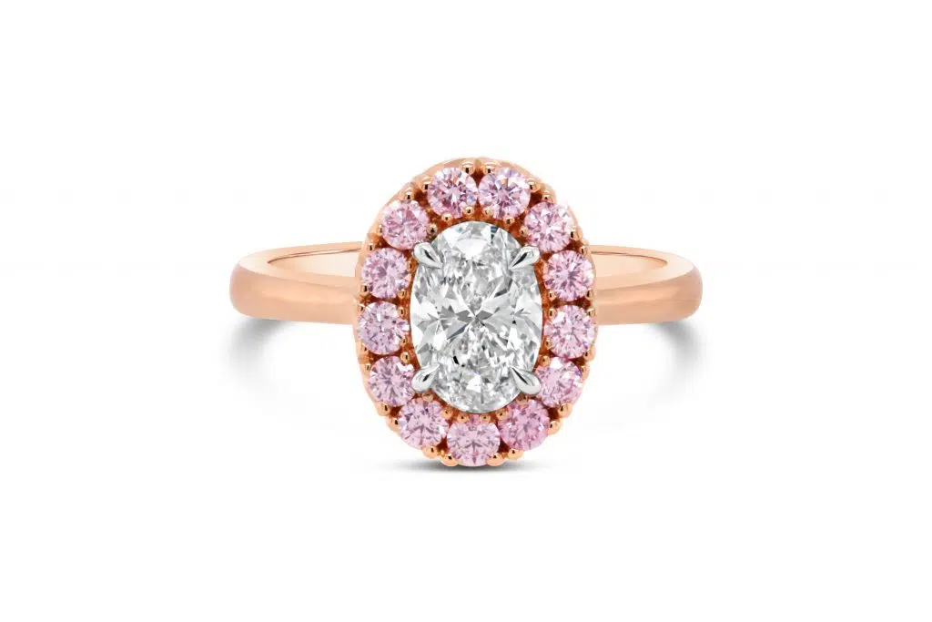 Halo pink diamond set ring