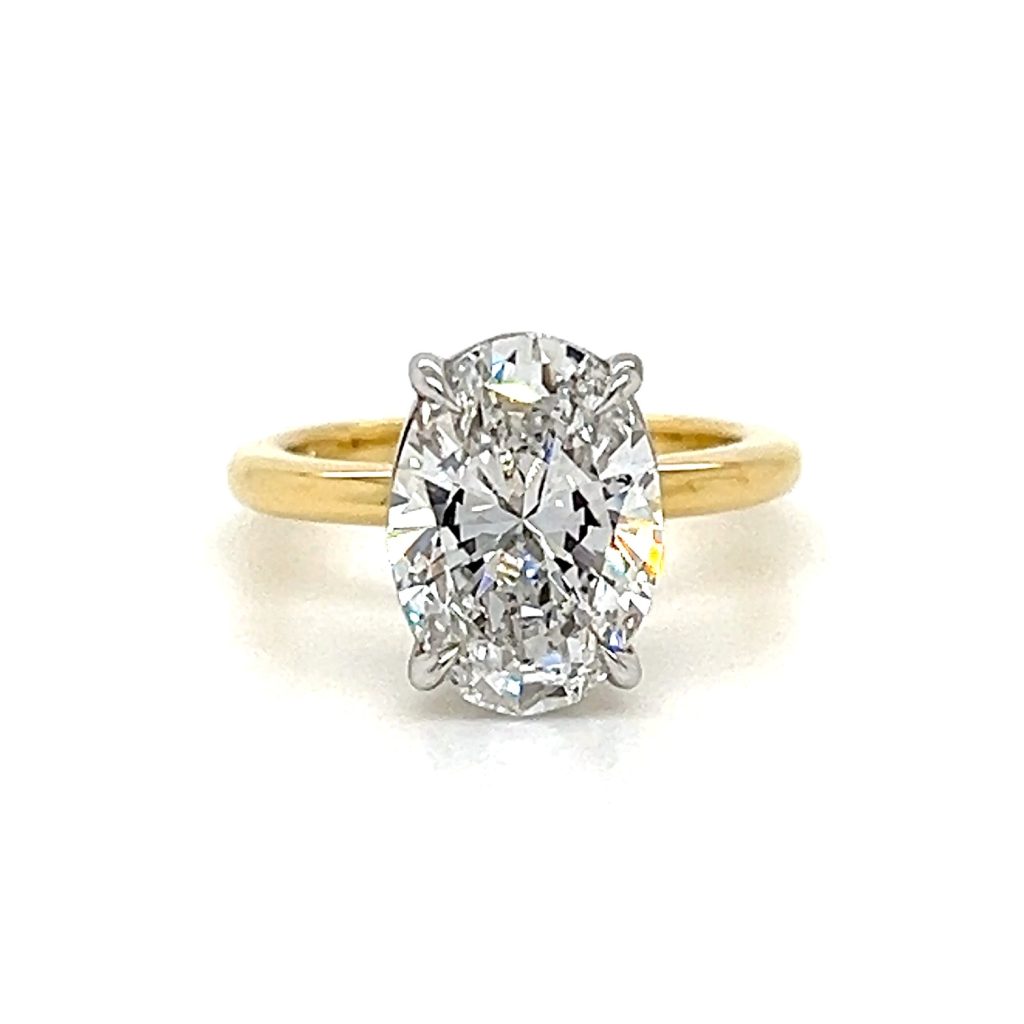 Oval solitaire engagement ring by Mark Nathan Jewellery.