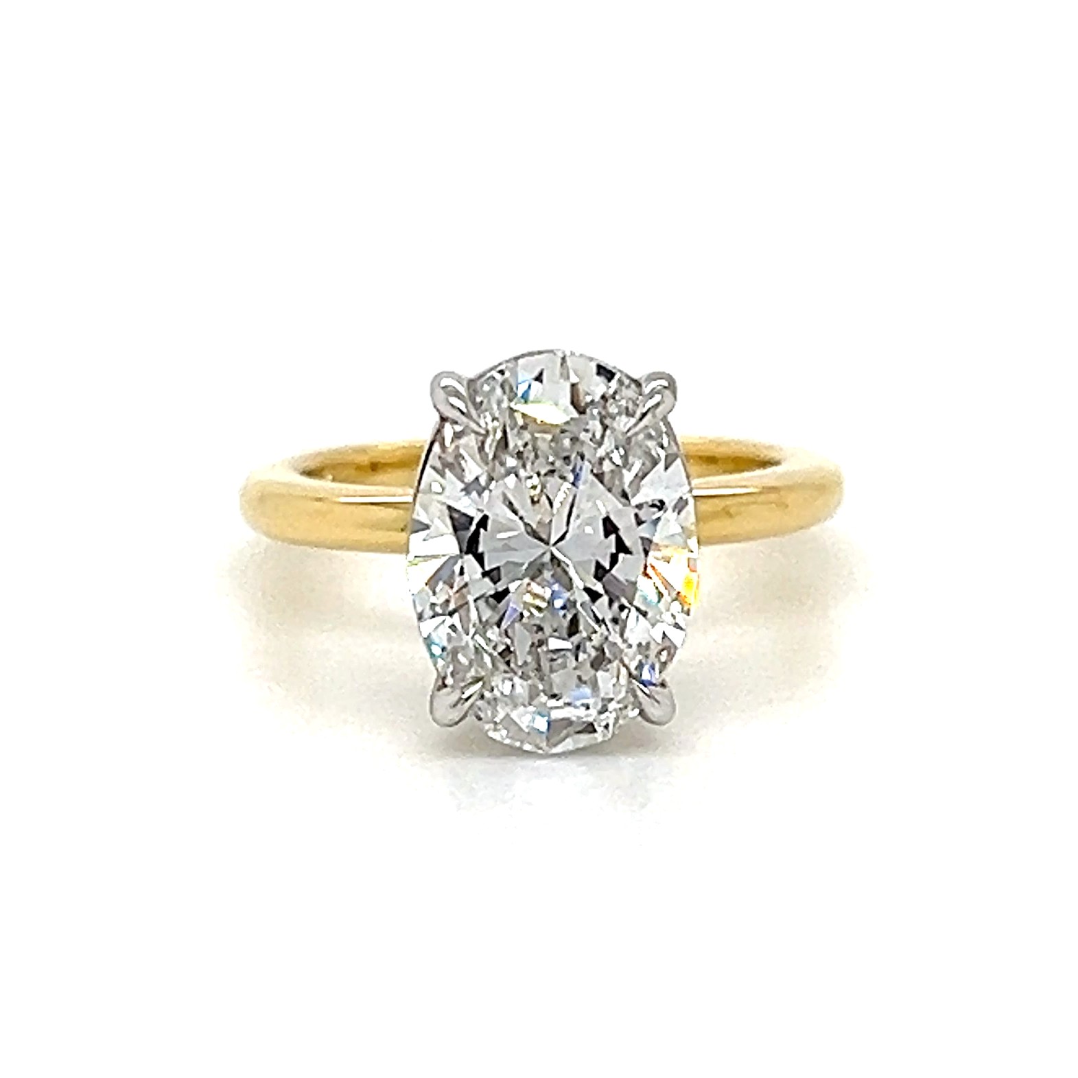 Oval solitaire engagement ring by Mark Nathan Jewellery.