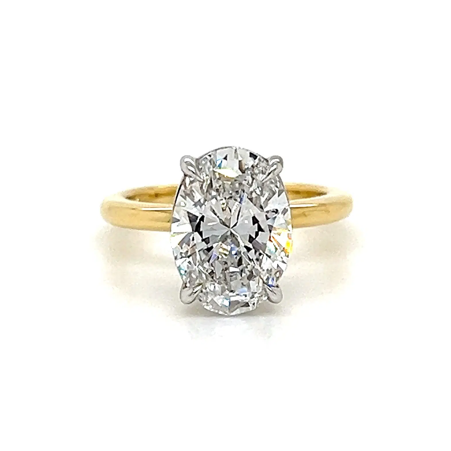 Oval solitaire engagement ring by Mark Nathan Jewellery.